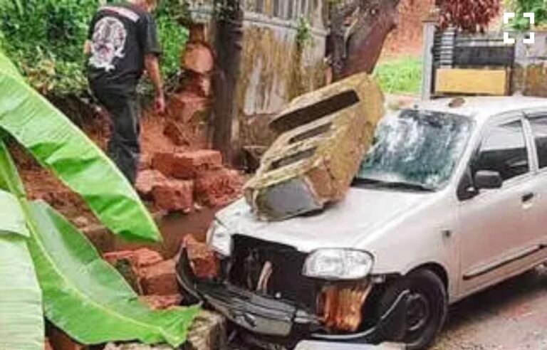 &nbsp;മതിൽ ഇടിഞ്ഞുവീണ് കാർ തകർന്നു